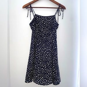 black white polka-dotted mini dress